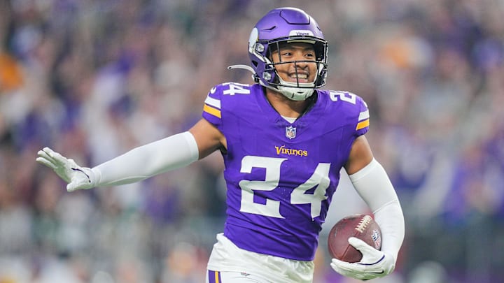 Dec 29, 2024; Minneapolis, Minnesota, USA; Minnesota Vikings safety Camryn Bynum (24) celebrates his fumble recovery against Green Bay Packers in the first quarter at U.S. Bank Stadium. Mandatory Credit: Brad Rempel-Imagn Images