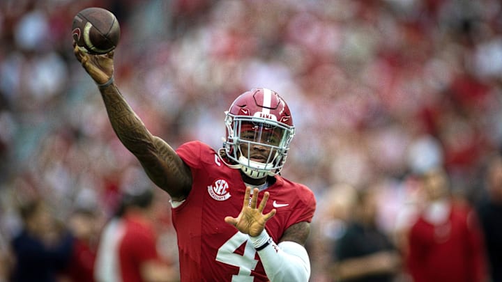 Sep 28, 2024; Tuscaloosa, Alabama, USA; Alabama Crimson Tide quarterback Jalen Milroe (4) throws a pass during warm ups before a game against the Georgia Bulldogs at Bryant-Denny Stadium. Mandatory Credit: Will McLelland-Imagn Images