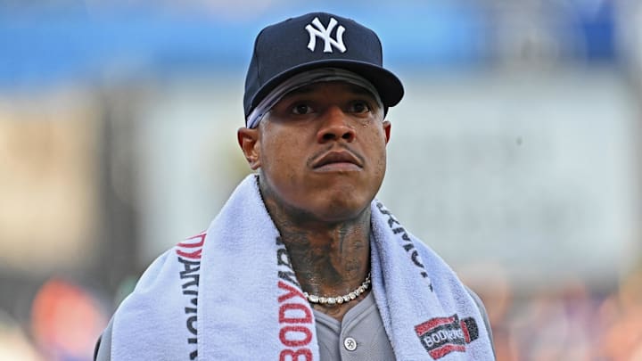 Jun 11, 2024; Kansas City, Missouri, USA; New York Yankees starting pitcher Marcus Stroman (0) looks on before a game against the Kansas City Royals at Kauffman Stadium. Mandatory Credit: Peter Aiken-Imagn Images Jun 11, 2024; Kansas City, Missouri, USA; New York Yankees starting pitcher Marcus Stroman (0) looks on before a game against the Kansas City Royals at Kauffman Stadium. Mandatory Credit: Peter Aiken-Imagn Images