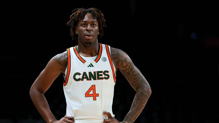 Nov 23, 2025; Coral Gables, Florida, USA; Miami Hurricanes guard Marcus Allen (4) looks on against the Delaware State Hornets during the first half at Watsco Center. Mandatory Credit: Sam Navarro-Imagn Images