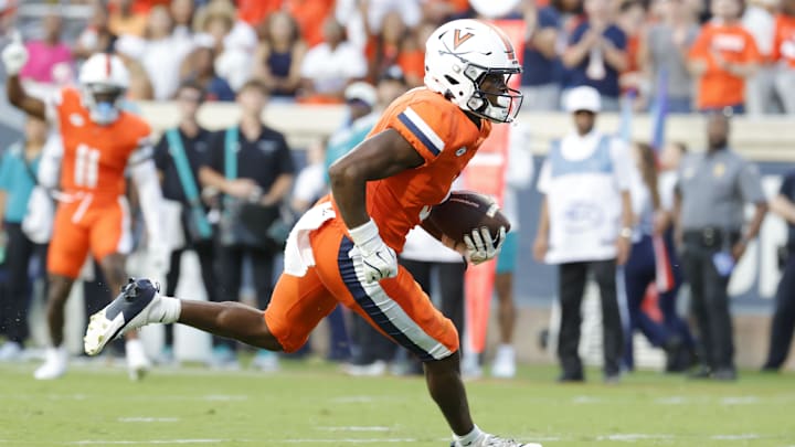 Aug 30, 2025; Charlottesville, Virginia, USA; Virginia Cavaliers wide receiver Cam Ross (6) carries the ball to score a touchdown against the Coastal Carolina Chanticleers during the second quarter at Scott Stadium. Mandatory Credit: Amber Searls-Imagn Images Aug 30, 2025; Charlottesville, Virginia, USA; Virginia Cavaliers wide receiver Cam Ross (6) carries the ball to score a touchdown against the Coastal Carolina Chanticleers during the second quarter at Scott Stadium. Mandatory Credit: Amber Searls-Imagn Images