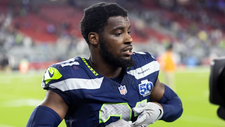 Sep 25, 2025; Glendale, Arizona, USA; Seattle Seahawks cornerback Devon Witherspoon (21) against the Arizona Cardinals at State Farm Stadium.