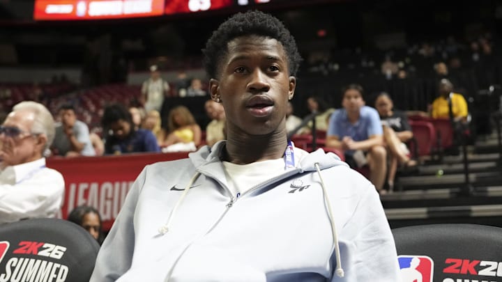 Jul 10, 2025; Las Vegas, NV, USA; Philadelphia 76ers guard VJ Edgecombe (77) watches the game against the San Antonio Spurs from the baseline at Thomas & Mack Center. Mandatory Credit: Candice Ward-Imagn Images