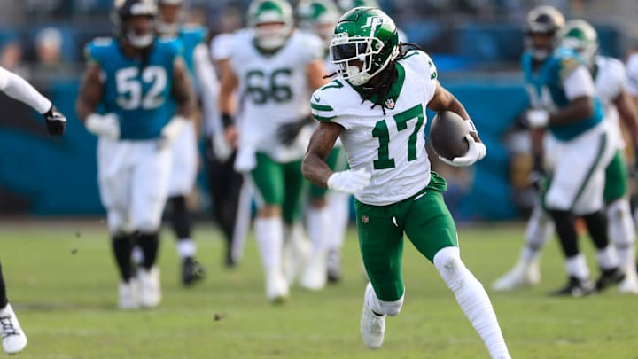 New York Jets wide receiver Davante Adams (17) rushes for yards during the third quarter Sunday, Dec. 15, 2024 at EverBank Stadium in Jacksonville, Fla. The Jets held off the Jaguars 32-25.