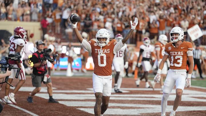 Texas Longhorns wide receiver DeAndre Moore Jr. reacts after making a reception for a touchdown during the second half against the Arkansas Razorbacks at Darrell K Royal-Texas Memorial Stadium.