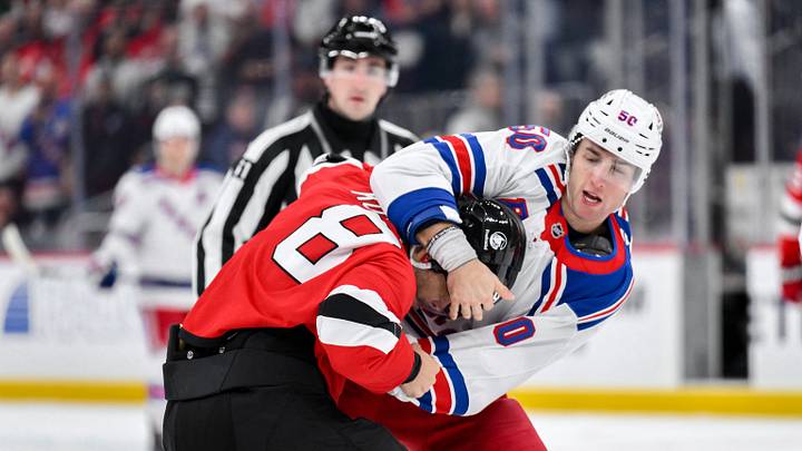 Oct 15, 2026; Newark, New Jersey, USA; New Jersey Devils defenseman Johnathan Kovacevic (8) and New York Rangers left wing Will Cuylle (50) fight during the first period at Prudential Center. Mandatory Credit: John Jones-Imagn Images Oct 15, 2026; Newark, New Jersey, USA; New Jersey Devils defenseman Johnathan Kovacevic (8) and New York Rangers left wing Will Cuylle (50) fight during the first period at Prudential Center. Mandatory Credit: John Jones-Imagn Images
