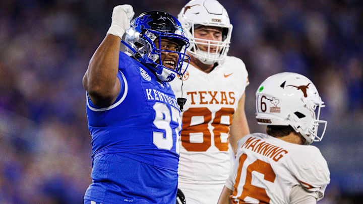 Kentucky Wildcats defensive lineman Josaih Hayes celebrates a defensive play during the third quarter against the Texas Longhorns at Kroger Field. Kentucky Wildcats defensive lineman Josaih Hayes celebrates a defensive play during the third quarter against the Texas Longhorns at Kroger Field.