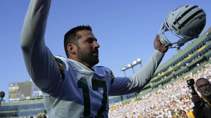 Oct 20, 2024; Green Bay, Wisconsin, USA;  Green Bay Packers kicker Brandon McManus (17) celebrates as he runs off the field following the game against the Houston Texans at Lambeau Field. Mandatory Credit: Jeff Hanisch-Imagn Images