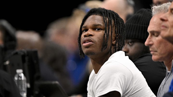 Jan 22, 2025; Dallas, Texas, USA; 2024 Heisman Trophy winner Travis Hunter Jr. looks during the first half of the game between the Dallas Mavericks and the Minnesota Timberwolves at the American Airlines Center. Mandatory Credit: Jerome Miron-Imagn Images Jan 22, 2025; Dallas, Texas, USA; 2024 Heisman Trophy winner Travis Hunter Jr. looks during the first half of the game between the Dallas Mavericks and the Minnesota Timberwolves at the American Airlines Center. Mandatory Credit: Jerome Miron-Imagn Images