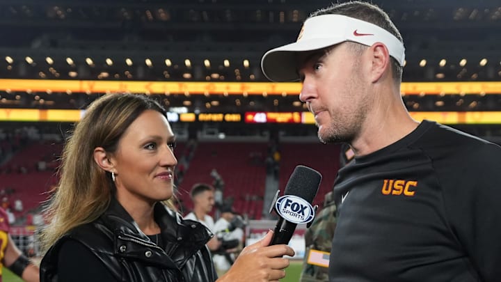 Oct 25, 2024; Los Angeles, California, USA; Southern California Trojans head coach Lincoln Riley is interviewed by FOX reporter Allison Williams after the game against the Rutgers Scarlet Knights at United Airlines Field at Los Angeles Memorial Coliseum.