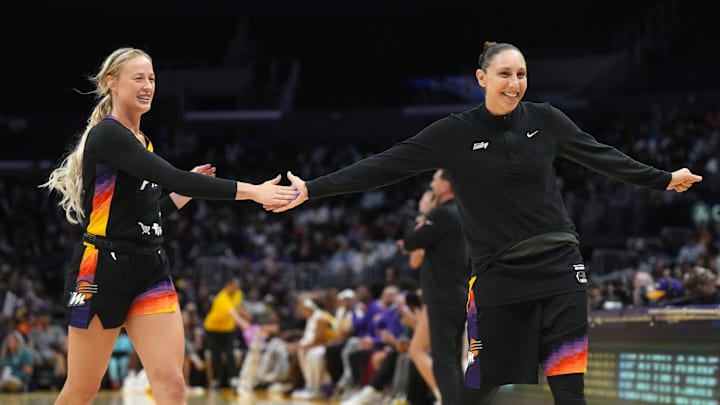 Sep 17, 2024; Los Angeles, California, USA; Phoenix Mercury guard Sophie Cunningham (9) and guard Diana Taurasi (3) celebrate in the second half against the LA Sparks at Crypto.com Arena. Mandatory Credit: Kirby Lee-Imagn Images