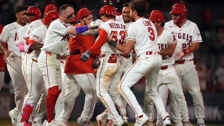Sep 17, 2026; Anaheim, California, USA; Los Angeles Angels left fielder Wade Meckler (53) celebrates with teammates after hitting a walk-off single in the 10th inning against the Minnesota Twins at Angel Stadium. Mandatory Credit: Kirby Lee-Imagn Images