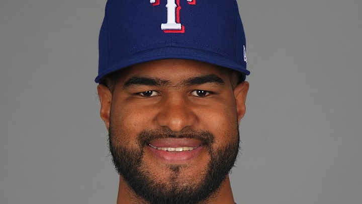 Feb 19, 2025; Surprise, AZ, USA; Texas Rangers pitcher Jose Corniell (87) poses for a photo during Media Day at Surprise Stadium