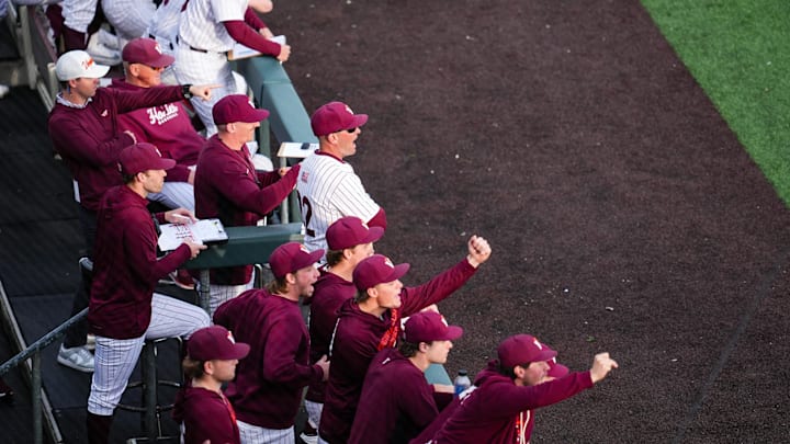 Virginia Tech dugout celebrating Virginia Tech dugout celebrating