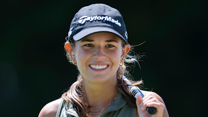 Kai Trump smiles after making a putt at the 41st Nicklaus Junior Championship at the Tequesta Country Club on June 23, 2025 in Tequesta, Florida.