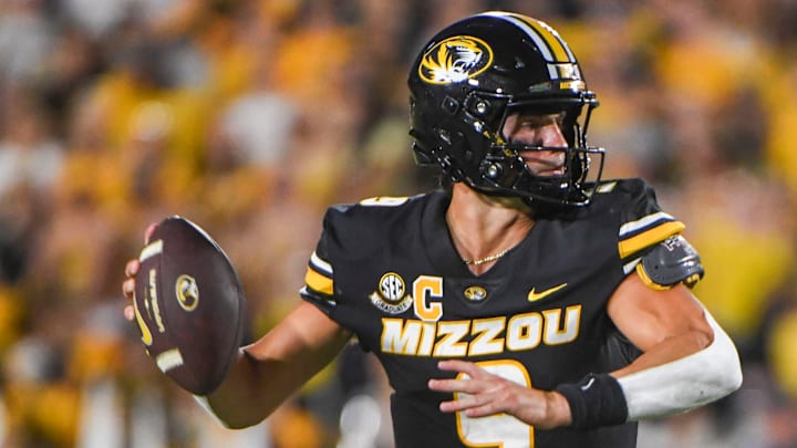 Aug 28, 2025; Columbia, MO, USA; Missouri Tigers quarterback Beau Pribula (9) cocks the ball back to find a receiver in a matchup against the Central Arkansas Bears in Faurot Field at Memorial Stadium. 