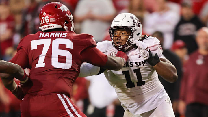 October 18, 2025: Tyler Onyedim (11) Texas A&M defensive lineman works to get around Arkansas offensive lineman EMarion Harris (76). Texas A&M defeated Arkansas 45-42 in Fayetteville, AR. 