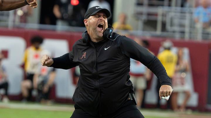 Sep 26, 2026; Tuscaloosa, AL, USA; Alabama defensive coordinator Kane Wommack celebrates a fourth down stop by his defense as South Carolina went for it at Saban Field at Bryant Denny Stadium. Mandatory Credit: Gary Cosby Jr.-Tuscaloosa News Sep 26, 2026; Tuscaloosa, AL, USA; Alabama defensive coordinator Kane Wommack celebrates a fourth down stop by his defense as South Carolina went for it at Saban Field at Bryant Denny Stadium. Mandatory Credit: Gary Cosby Jr.-Tuscaloosa News