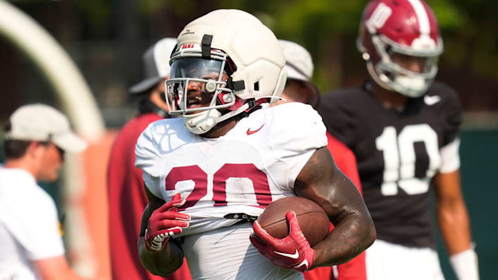 Running back Dre Washington runs the ball during practice for the Alabama Crimson Tide.