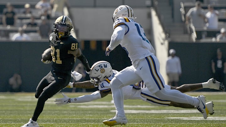 Oct 18, 2025; Nashville, Tennessee, USA; Vanderbilt Commodores wide receiver Kayleb Barnett (81) runs with the ball after a made catch against the Louisiana State Tigers during the first half at FirstBank Stadium. Mandatory Credit: Steve Roberts-Imagn Images Oct 18, 2025; Nashville, Tennessee, USA; Vanderbilt Commodores wide receiver Kayleb Barnett (81) runs with the ball after a made catch against the Louisiana State Tigers during the first half at FirstBank Stadium. Mandatory Credit: Steve Roberts-Imagn Images