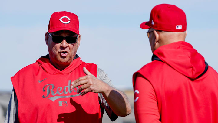 Cincinnati Reds manger Terry Francona chats with bench coach Brad Mills during spring training, Friday, Feb. 21, 2025, at the Cincinnati Reds Player Development Complex in Goodyear, Ariz.