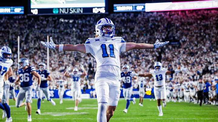 BYU punt returner Parker Kingston returns a punt for a touchdown against Kansas State