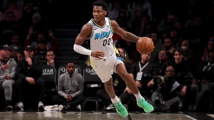 Jan 6, 2025; Brooklyn, New York, USA; Indiana Pacers guard Bennedict Mathurin (00) brings the ball up court against the Brooklyn Nets during the first quarter at Barclays Center. Mandatory Credit: Brad Penner-Imagn Images