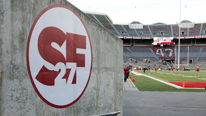 A sign honoring former Nebraska Cornhuskers punter Sam Foltz (27)