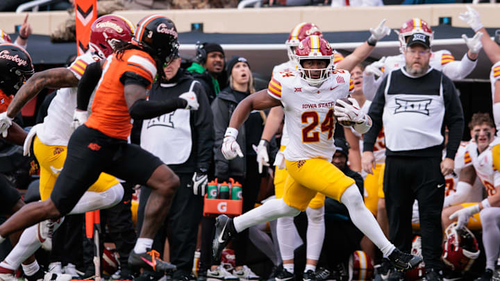Nov 29, 2025; Stillwater, Oklahoma, USA; Iowa State Cyclones running back Abu Sama (24) runs during the first half against the Oklahoma State Cowboys at Boone Pickens Stadium. Mandatory Credit: William Purnell-Imagn Images
