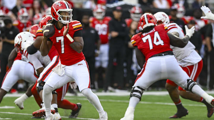 Oct 11, 2025; College Park, Maryland, USA; Maryland Terrapins guard Isaiah Wright (74) blocks for quarterback Malik Washington (7) during the game against the Nebraska Cornhuskers at SECU Stadium.
