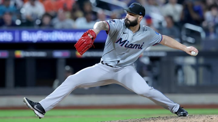Jun 13, 2024; New York City, New York, USA; Miami Marlins relief pitcher Tanner Scott (66) pitches against the New York Mets during the ninth inning at Citi Field.