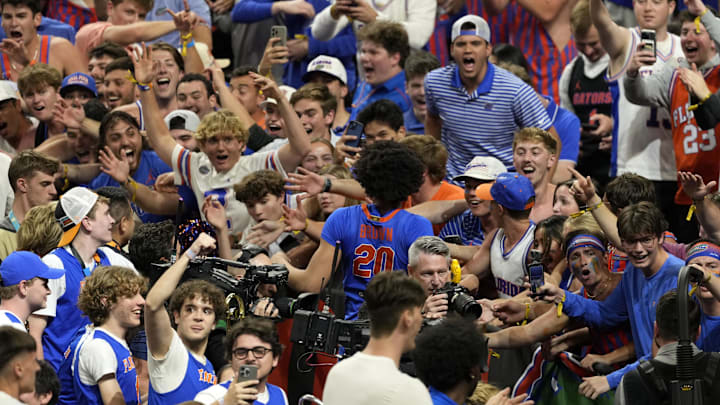 Apr 5, 2025; San Antonio, TX, USA; Florida Gators guard Isaiah Brown (20) reacts with the crowd after defeating the Auburn Tigers in the semifinals of the men's Final Four of the 2025 NCAA Tournament at Alamodome. Mandatory Credit: Scott Wachter-Imagn Images Apr 5, 2025; San Antonio, TX, USA; Florida Gators guard Isaiah Brown (20) reacts with the crowd after defeating the Auburn Tigers in the semifinals of the men's Final Four of the 2025 NCAA Tournament at Alamodome. Mandatory Credit: Scott Wachter-Imagn Images