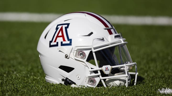 Nov 25, 2022; Tucson, Arizona, USA; Detailed view of an Arizona Wildcats helmet on the field during the Territorial Cup at Arizona Stadium. Mandatory Credit: Mark J. Rebilas-Imagn Images
