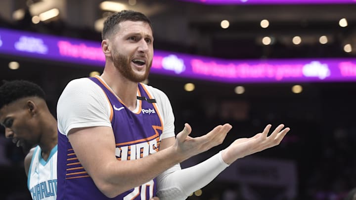 Jan 7, 2025; Charlotte, North Carolina, USA; Phoenix Suns center Jusuf Nurkic (20) reacts after being called on a foul during the second half against the Charlotte Hornets at the Spectrum Center. Mandatory Credit: Sam Sharpe-Imagn Images Jan 7, 2025; Charlotte, North Carolina, USA; Phoenix Suns center Jusuf Nurkic (20) reacts after being called on a foul during the second half against the Charlotte Hornets at the Spectrum Center. Mandatory Credit: Sam Sharpe-Imagn Images