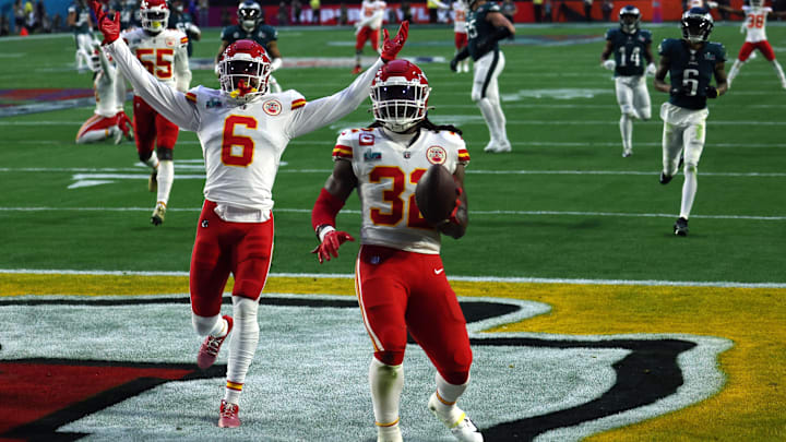 Feb 12, 2023; Glendale, Arizona, US; Kansas City Chiefs linebacker Nick Bolton (32) runs for a touchdown after recovering a fumble against the Philadelphia Eagles in the second quarter of Super Bowl LVII at State Farm Stadium. Mandatory Credit: Bill Streicher-Imagn Images