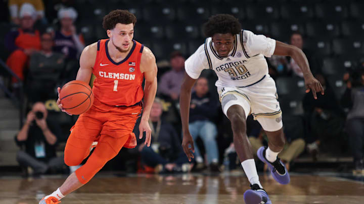 Jan 14, 2025; Atlanta, Georgia, USA; Clemson Tigers guard Chase Hunter (1) dribbles the ball down the court against Georgia Tech Yellow Jackets forward Ibrahim Souare (30) during the second half at McCamish Pavilion. Jan 14, 2025; Atlanta, Georgia, USA; Clemson Tigers guard Chase Hunter (1) dribbles the ball down the court against Georgia Tech Yellow Jackets forward Ibrahim Souare (30) during the second half at McCamish Pavilion.