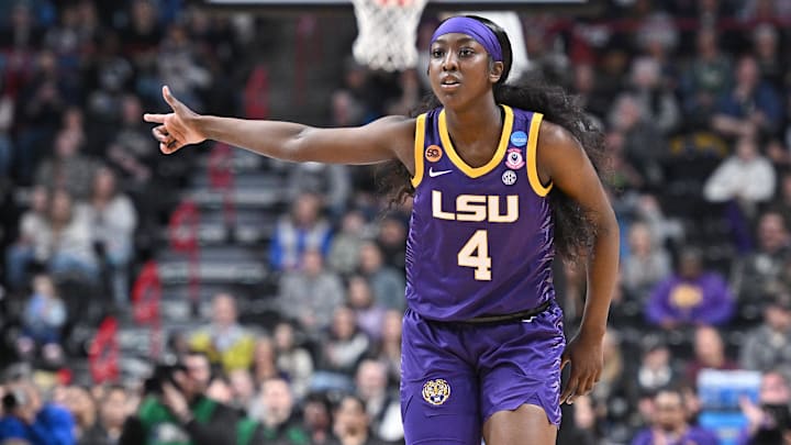 Mar 30, 2025; Spokane, WA, USA; LSU Lady Tigers guard Flau'Jae Johnson (4) reacts after play against the UCLA Bruins during the first half of a Elite 8 NCAA Tournament basketball game at Spokane Arena. Mandatory Credit: James Snook-Imagn Images