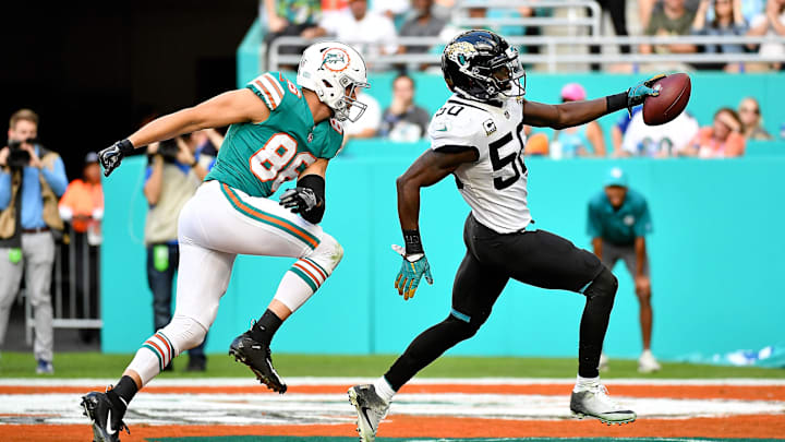 Dec 23, 2018; Miami Gardens, FL, USA; Jacksonville Jaguars outside linebacker Telvin Smith (50) runs back an interception for a touchdown against the Miami Dolphins during the second half at Hard Rock Stadium. Mandatory Credit: Jasen Vinlove-Imagn Images Dec 23, 2018; Miami Gardens, FL, USA; Jacksonville Jaguars outside linebacker Telvin Smith (50) runs back an interception for a touchdown against the Miami Dolphins during the second half at Hard Rock Stadium. Mandatory Credit: Jasen Vinlove-Imagn Images