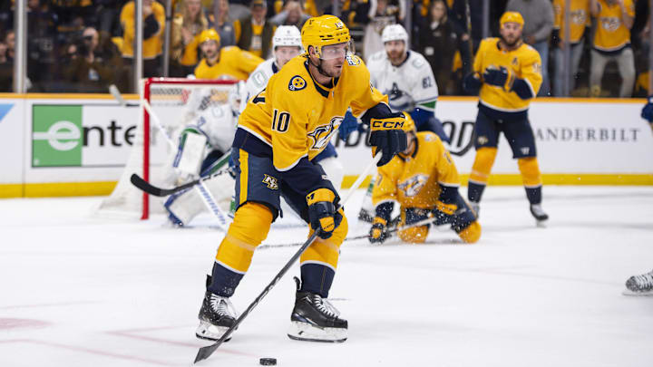 Apr 26, 2024; Nashville, Tennessee, USA; Nashville Predators center Colton Sissons (10) skates against the Vancouver Canucks during the third period in game three of the first round of the 2024 Stanley Cup Playoffs at Bridgestone Arena. Mandatory Credit: Steve Roberts-Imagn Images