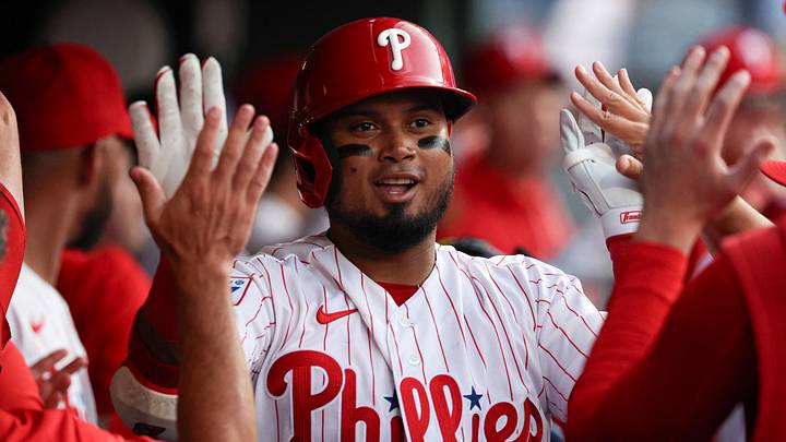 Aug 19, 2026; Philadelphia, Pennsylvania, USA; Philadelphia Phillies second baseman Luis Arraez (4) high fives in the dugout after hitting a two RBI home run during the third inning against the Miami Marlins during the third inning at Citizens Bank Park. Mandatory Credit: Bill Streicher-Imagn Images