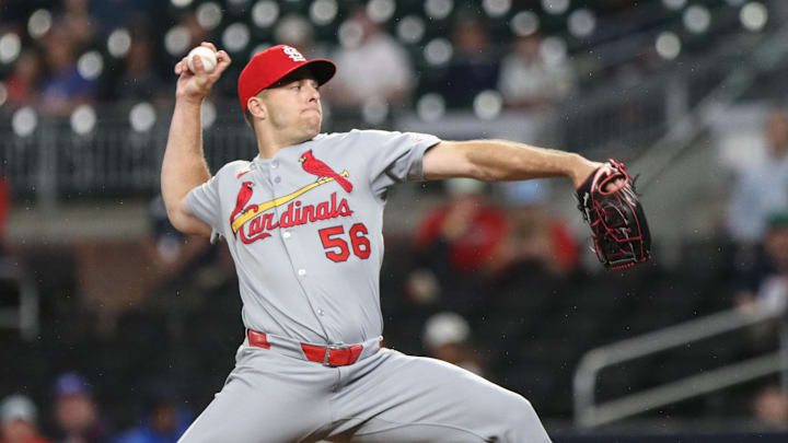 Apr 22, 2025; Cumberland, Georgia, USA; St. Louis Cardinals pitcher Ryan Helsley (56) pitches the ball against the Atlanta Braves during the ninth inning at Truist Park. Mandatory Credit: Jordan Godfree-Imagn Images