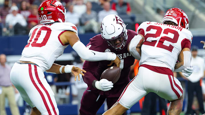 Texas A&M Aggies defensive lineman Shemar Stewart (4) causes a fumble against Arkansas.