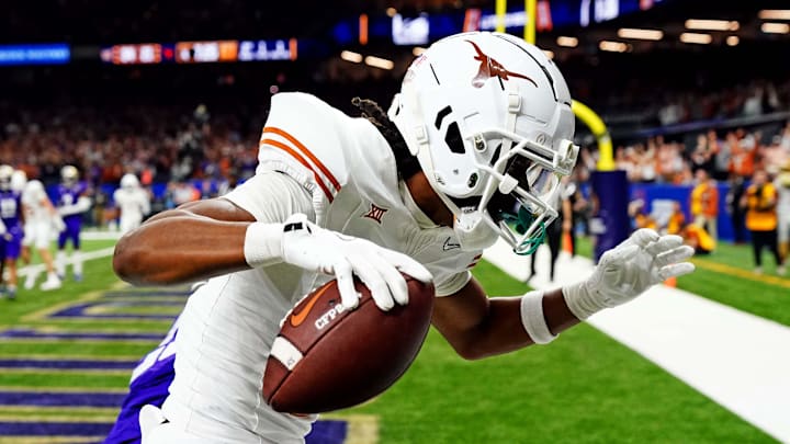 Jan 1, 2024; New Orleans, LA, USA; Texas Longhorns wide receiver Adonai Mitchell (5) catches a