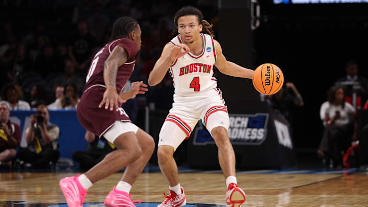 Mar 21, 2026; Oklahoma City, OK, USA; Houston Cougars guard Kingston Flemings (4) drives to the hoop past Texas A&M Aggies guard Marcus Hill (0) during the first half of a second round game of the men's 2026 NCAA Tournament at Paycom Center. Mar 21, 2026; Oklahoma City, OK, USA; Houston Cougars guard Kingston Flemings (4) drives to the hoop past Texas A&M Aggies guard Marcus Hill (0) during the first half of a second round game of the men's 2026 NCAA Tournament at Paycom Center.