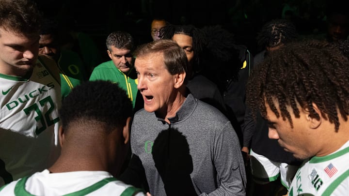 Oregon men's basketball coach Dana Altman talks to his team before their game against Troy at Matthew Knight Arena in Eugene Sunday, Nov. 17, 2024.