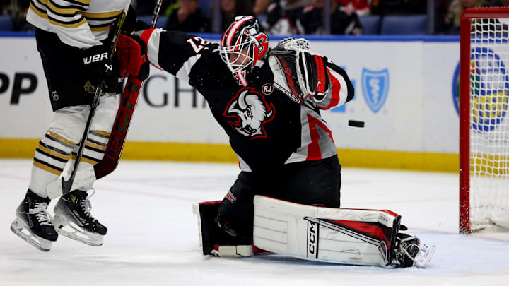Dec 27, 2023; Buffalo, New York, USA;  Buffalo Sabres goaltender Devon Levi (27) makes a save during