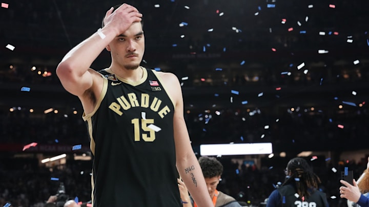 A dejected Purdue Boilermakers center Zach Edey (15) walks off the court after losing the Men's NCAA national championship game to Connecticut Huskies at State Farm Stadium in Glendale on April 8, 2024.