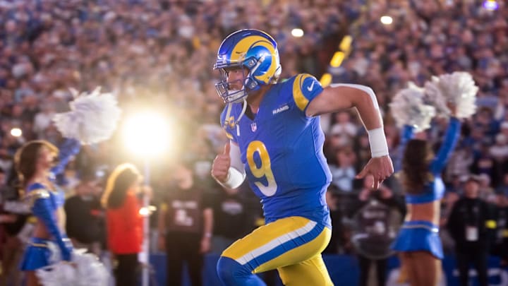 Jan 13, 2025; Glendale, AZ, USA; Los Angeles Rams quarterback Matthew Stafford (9) against the Minnesota Vikings during an NFC wild card game at State Farm Stadium. Mandatory Credit: Mark J. Rebilas-Imagn Images