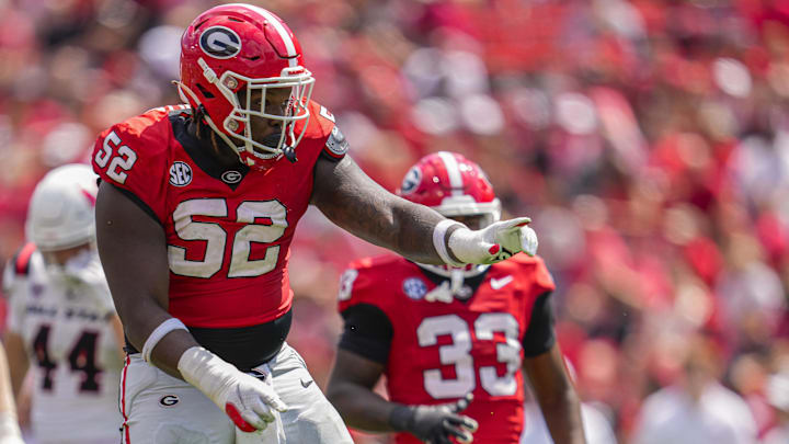 Georgia Bulldogs DT Christen Miller reacts after making a tackle against the Ball State Cardinals during the second half at Sanford Stadium. Georgia Bulldogs DT Christen Miller reacts after making a tackle against the Ball State Cardinals during the second half at Sanford Stadium.