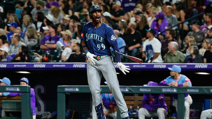 Sep 18, 2026; Denver, Colorado, USA; Seattle Mariners right fielder Lazaro Montes (99) tosses his bat on a solo home run in the ninth inning against the Colorado Rockies at Coors Field. Mandatory Credit: Isaiah J. Downing-Imagn Images Sep 18, 2026; Denver, Colorado, USA; Seattle Mariners right fielder Lazaro Montes (99) tosses his bat on a solo home run in the ninth inning against the Colorado Rockies at Coors Field. Mandatory Credit: Isaiah J. Downing-Imagn Images
